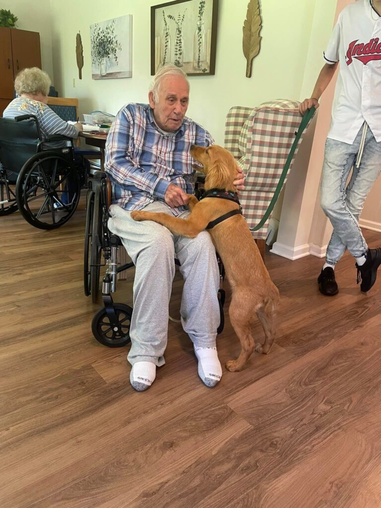 Residential assisted living resident enjoying an in-home activity.