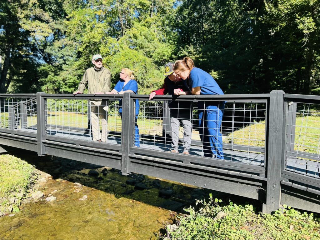 Residential assisted living community enjoying the creek outside the home.